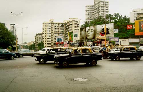 Taxis at lights in Bombay