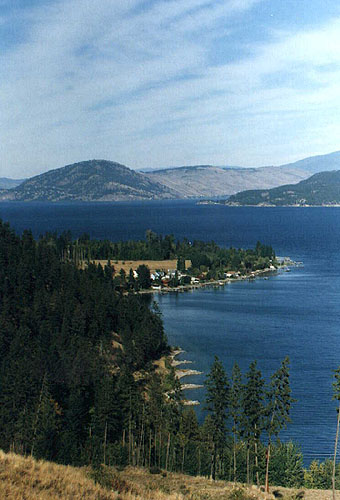 A view of the Okanagan Lake with Sugarloaf Mt. In the background